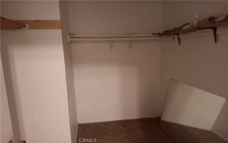 Generous walk-in closet in primary bedroom