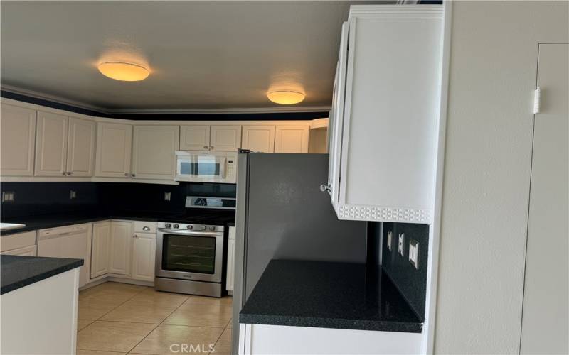 Kitchen with VIEWS and open to Living Room and Dining area