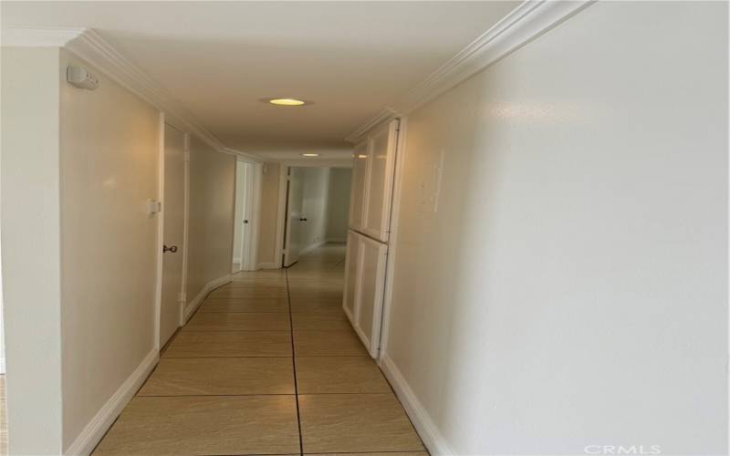 Hall leading to bathroom and bedrooms