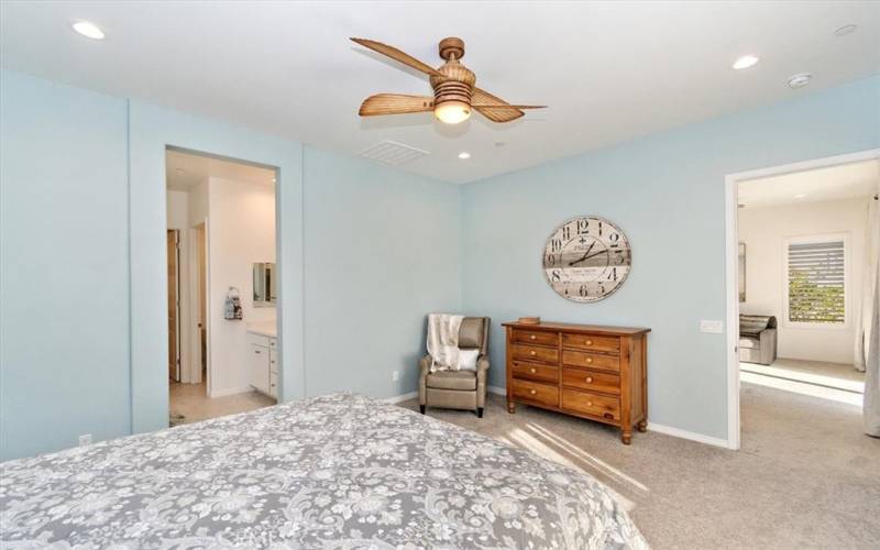 Primary bedroom leading to ensuite bathroom