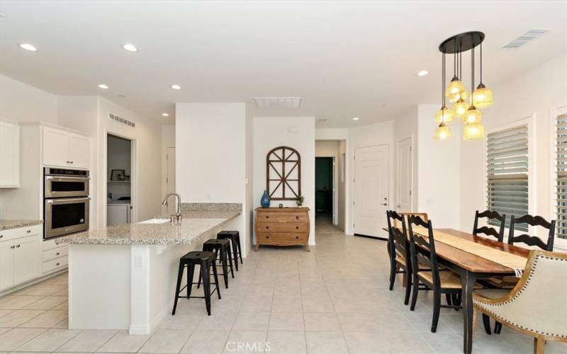 Dining view facing secondary bedroom - Kitchen facing indoor laundry