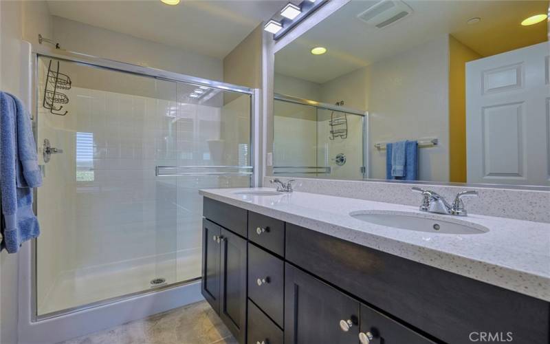 Master bedroom 3/4 bath with dual sink vanity