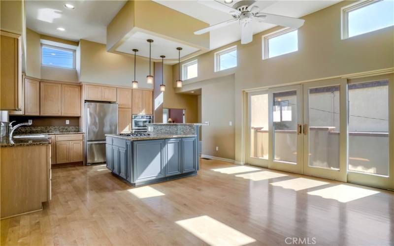 Incredible kitchen with an abundance of windows to let in the natrual light along with sliders that open to one of 4 balconies....perfect for letting in the beach breezes