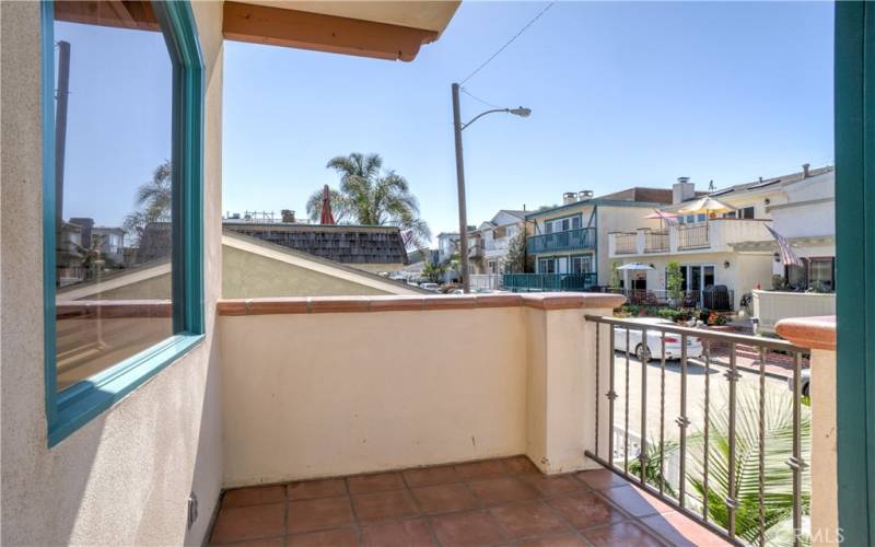 Front balcony off of the living room with west facing exposure just one of the many places to sit back and relax