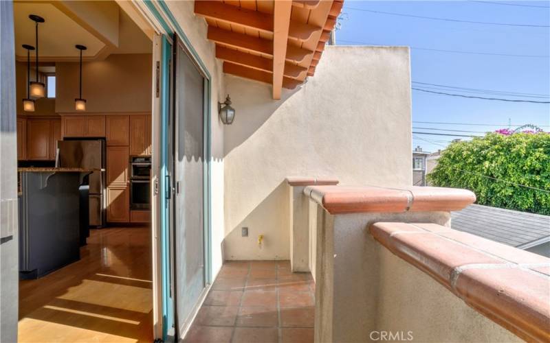 West facing balcony off of the kitchen and living....open the sliders to enjoy the incredible beach breezes and sunshine.