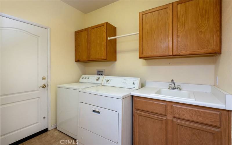 Indoor laundry room with garage access