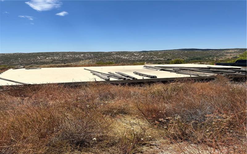 Roof on shop building on adjoining 20 acre that is also for sale.