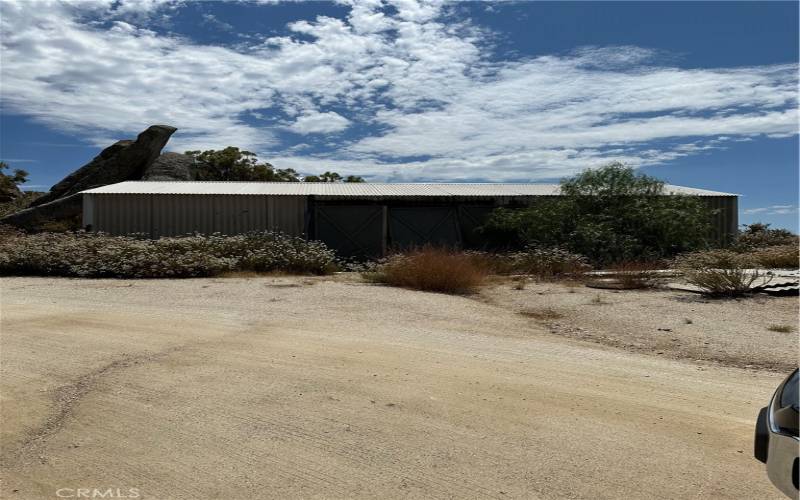 Large storage shed on adjoining 20 acre that is also for sale.