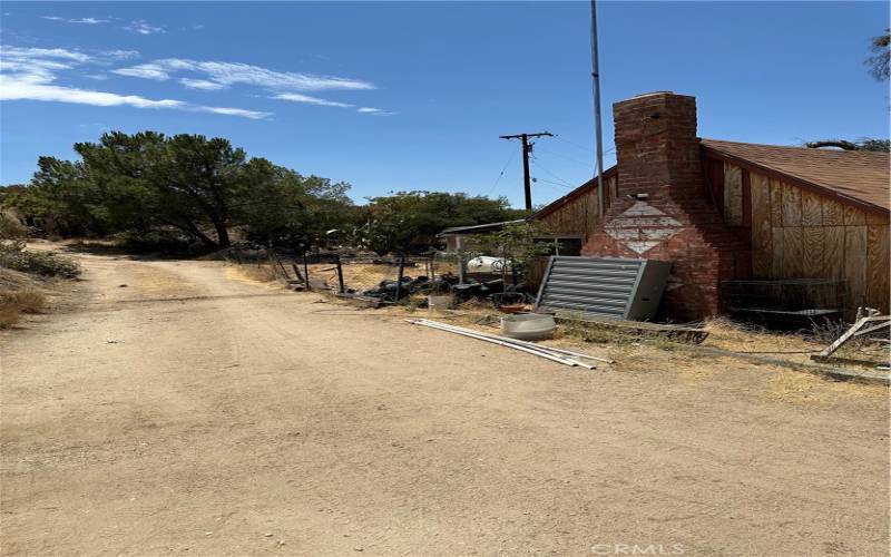 Side of house on adjoining 20 acres that is also for sale.