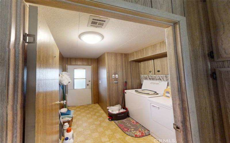 Separate Laundry Room with Carport Access