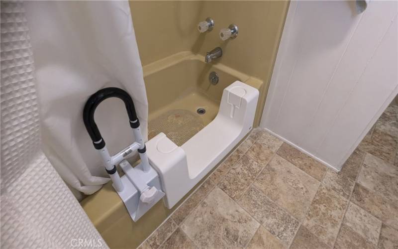 Primary Bath has been Uniquely Converted to a walk-in shower ~ There is an insert that easily converts back to a tub!