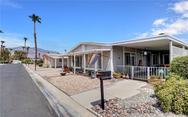 Home exterior- adjacent to walkway for easy access to clubhouse.