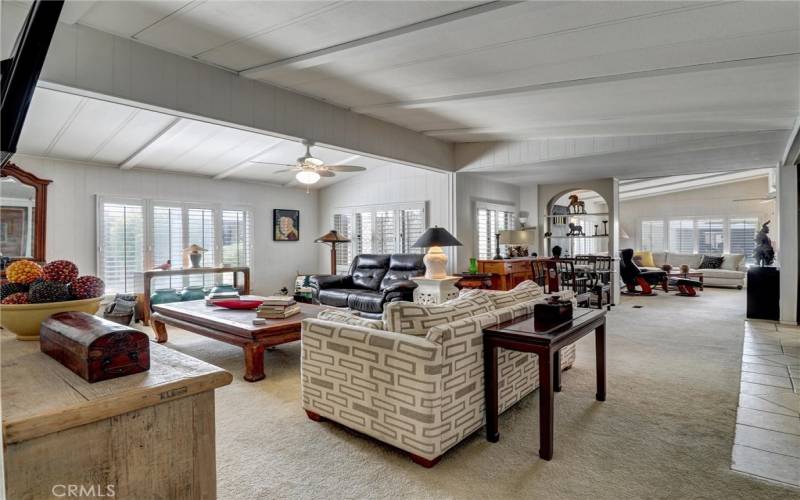 Living area with vaulted ceilings.