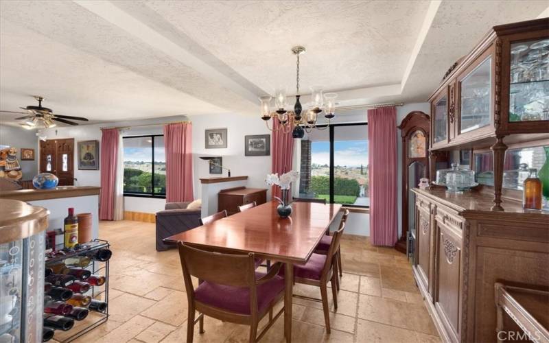 Primary Home - Formal Dining Room with Chandelier and Views to the Front of the Property