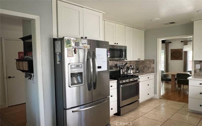 Kitchen With Quartz Countertop and Stainless Steel Appliances