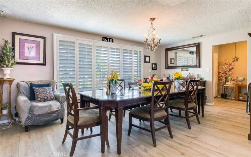 Living/Dining Area off Entry Windows with Shutters