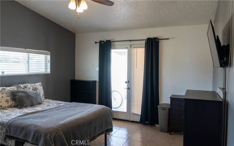 master bedroom with own exit to the pool