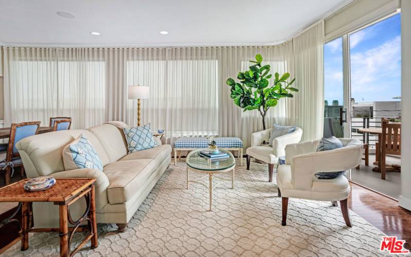 Living room with ocean view balcony