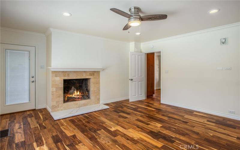 Bedroom 1 has fireplace, ample closet and a private door to the backyard/patio.