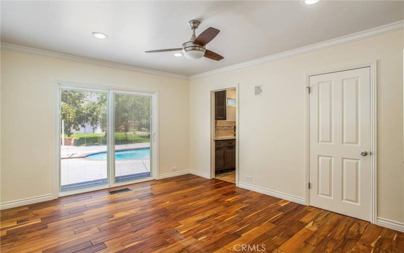 Primary Bedroom features 2 closets and also has slider to the backyard.