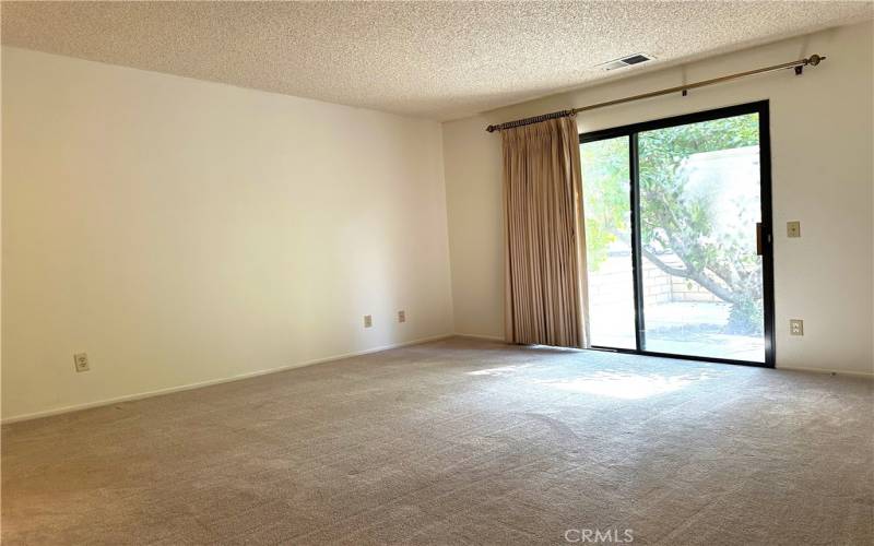 Main bedroom with slider to back patio