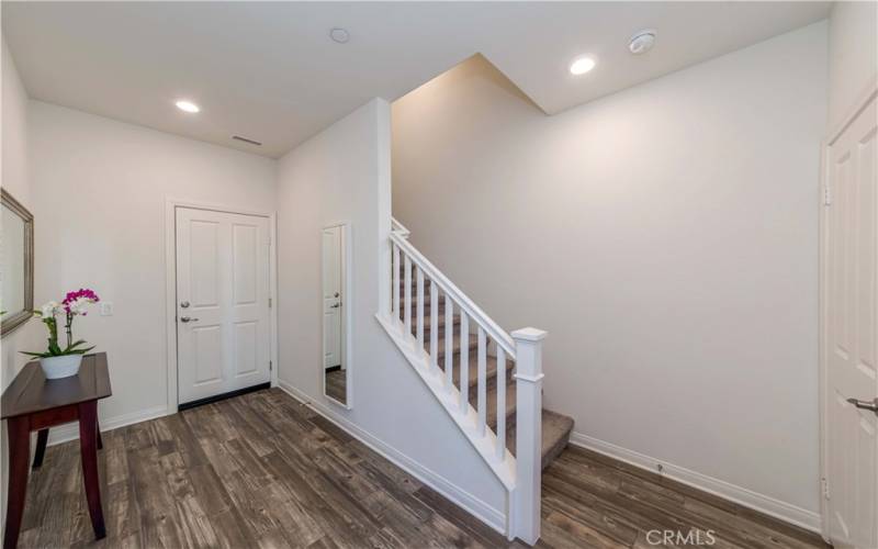 Foyer to front door, 2 car garage and master suite