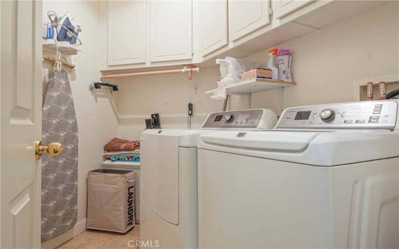 Laundry room with cabinet sorage