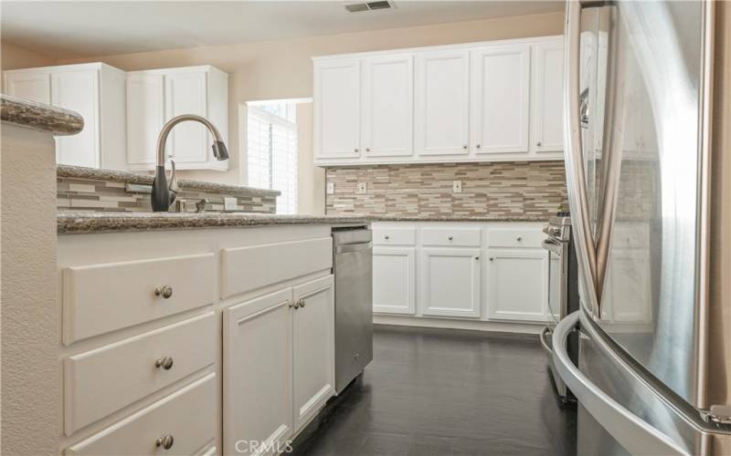 White Cabinetry with pull out trays