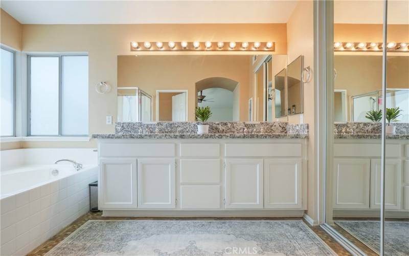 Mirror wardrobe doors at the master bath area