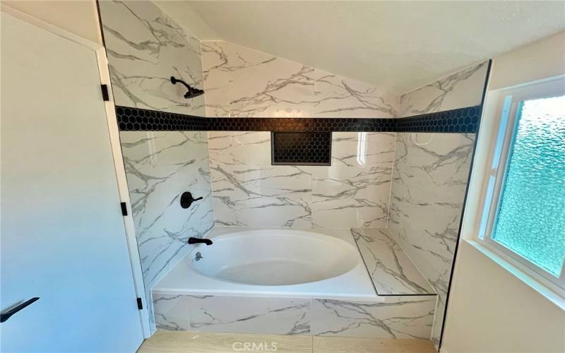 Guest bathroom soaking tub