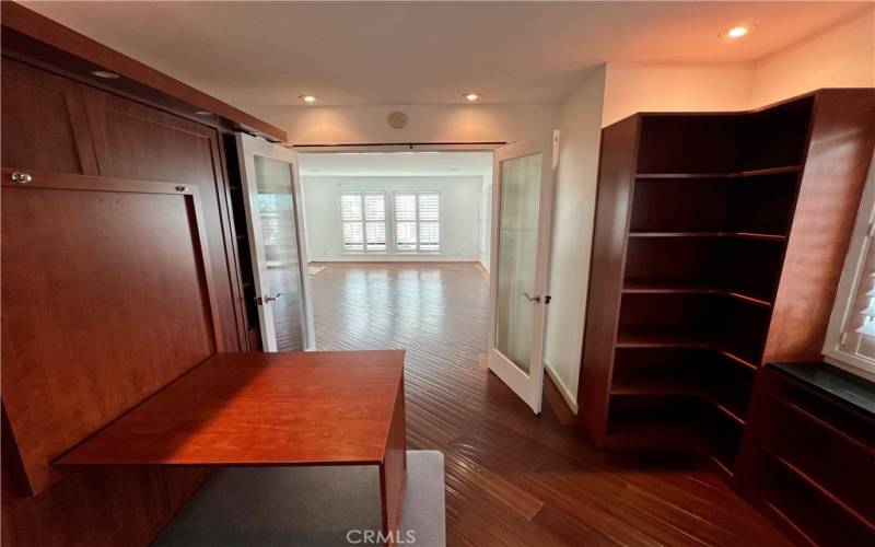 The secondary bedroom has a Murphy bed...when it is retracted, an office desk appears.  Great use of space.