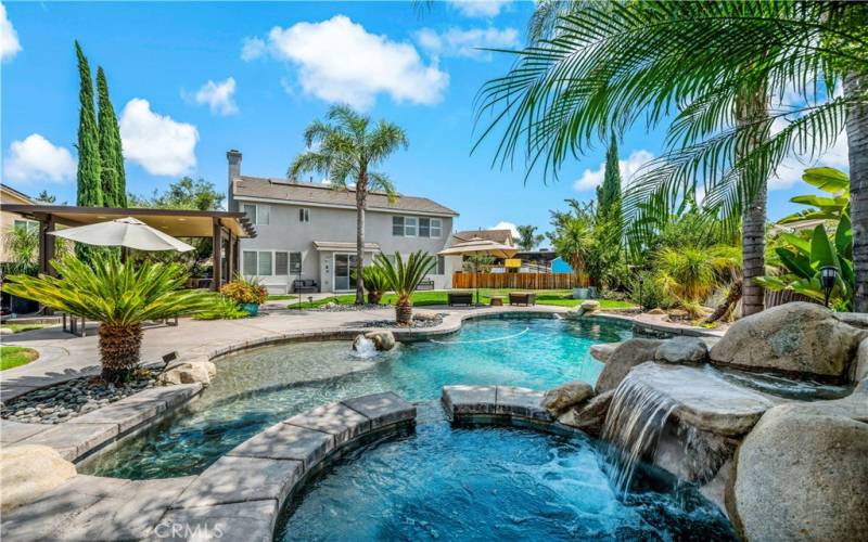 Sparkling pool with 3 waterfalls.