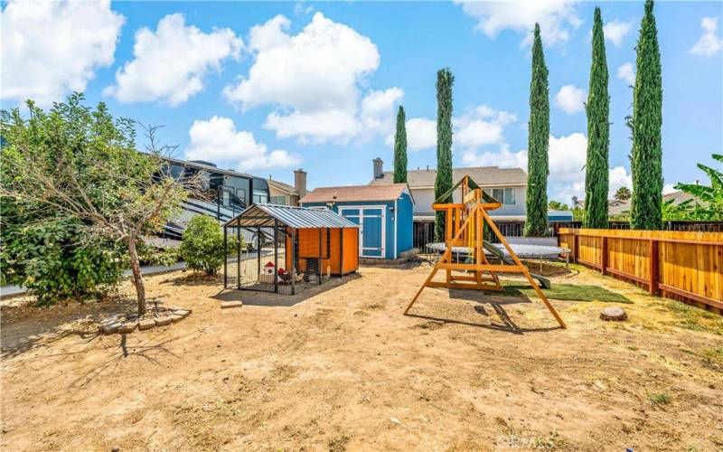 Separated by a new fence, this huge side yard offers plenty of room for all the things you want to do, even potentially an ADU.