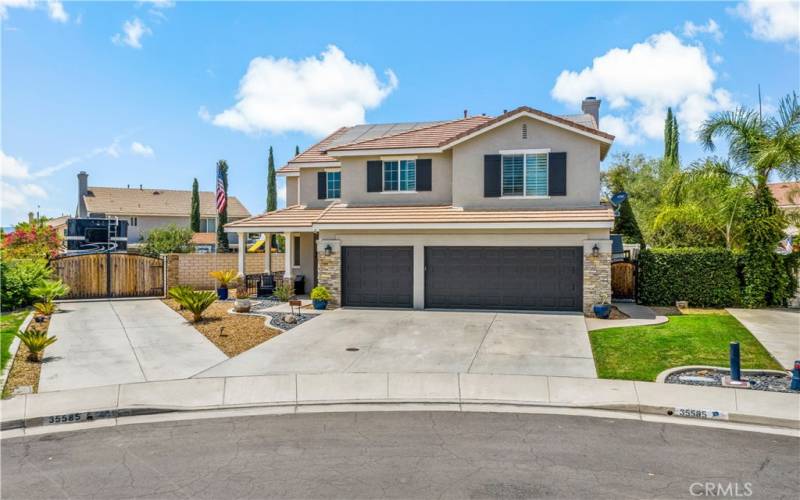 Cul-de-sac home with 3 car side by side garage and gated RV parking with Hookups!