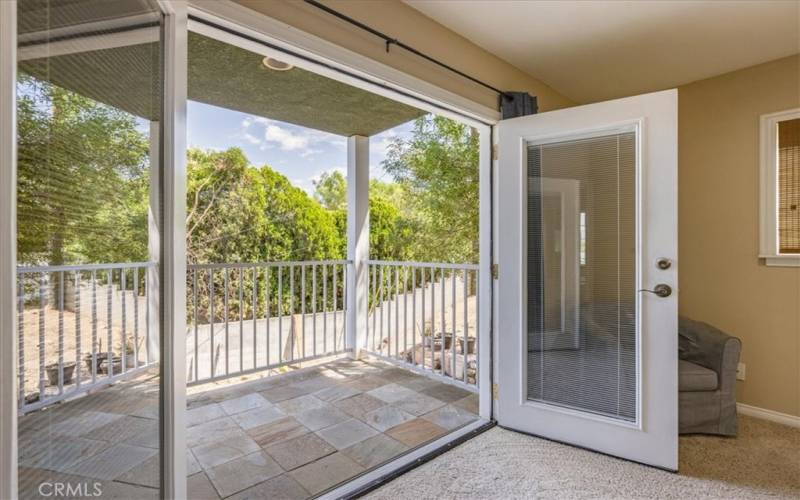 Balcony entrance from primary bedroom