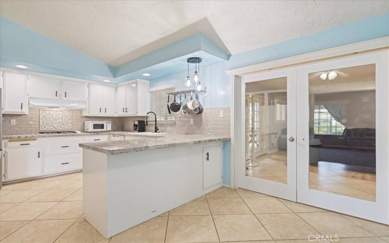 Second view of kitchen showing the connection to Bonus Room