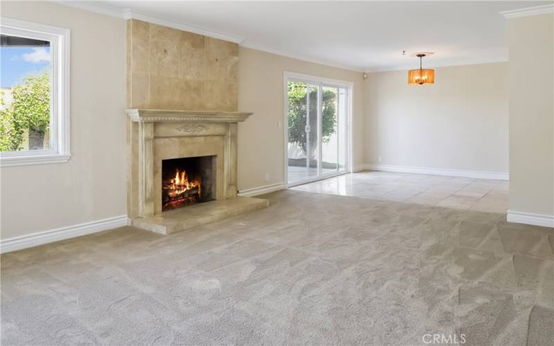 Super spacious living room with fireplace. Suitable for any gathering.