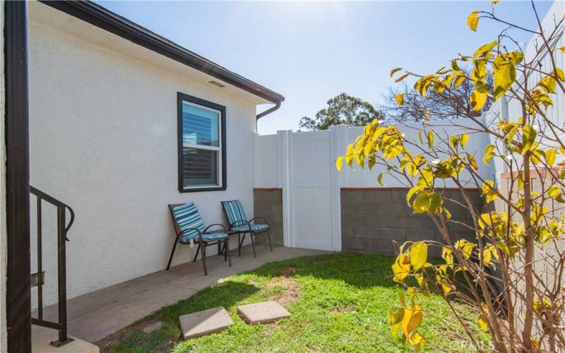 Nice quiet green yard in front of the Laundry Room entry