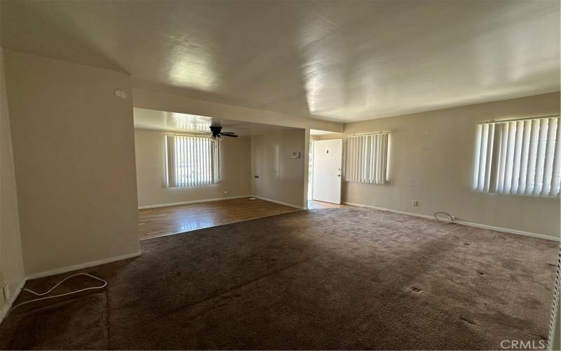 view of living room, dinning area and front door entrance