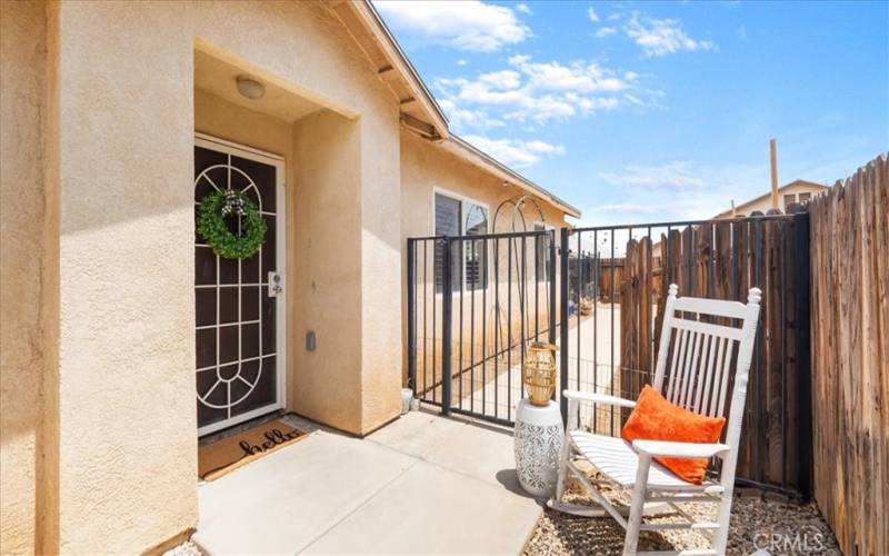 Front door with entrance to backyard