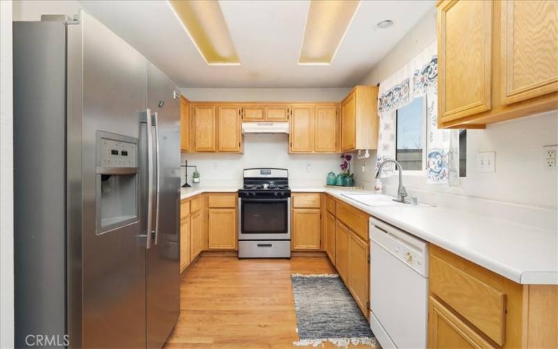 Bright kitchen with ample storage.