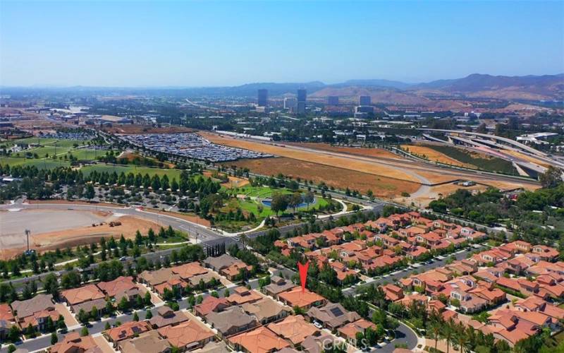Aerial view with Irvine Spectrum and 405/5 fwy intersection in background.