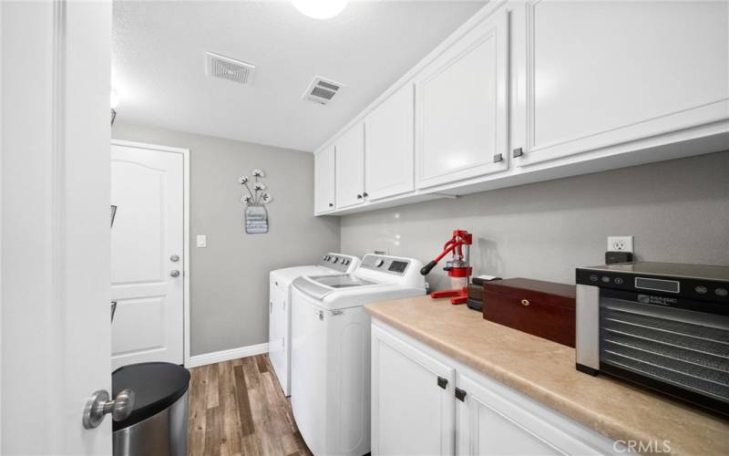 Large Laundry room with storage