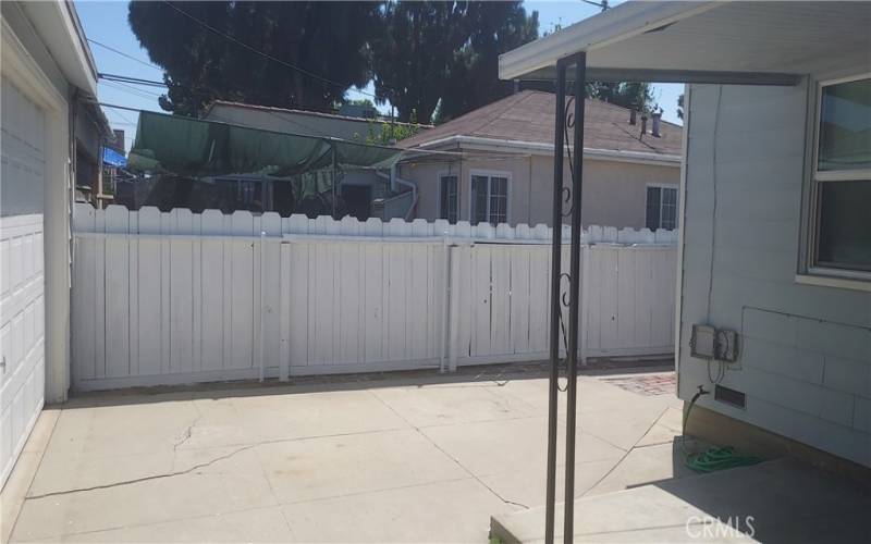 Driveway adjacent to covered patio