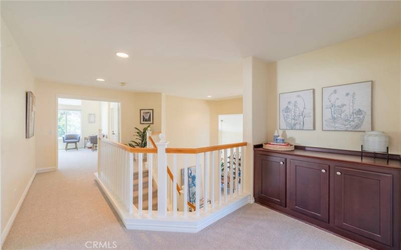 Upstairs hallways with additional storage.