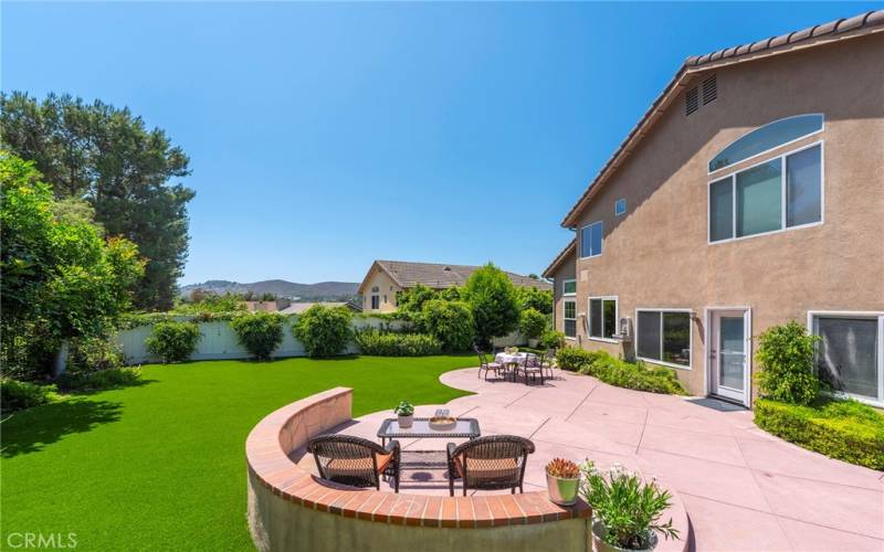 Enjoy your meals and time in this relaxing backyard.