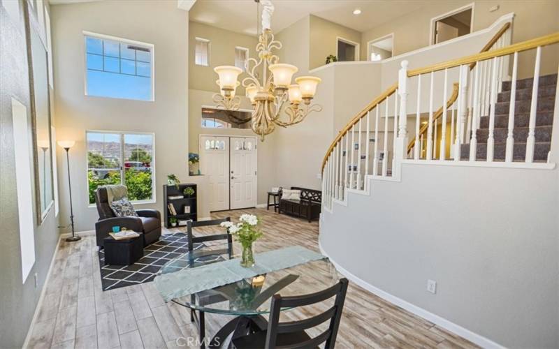 Formal dining facing living room and entry