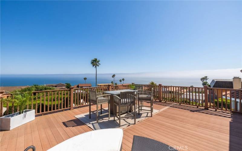 On clear days, the views stretch all the way to Santa Barbara Island. Private Spanish-tiled stairs lead down to the patio, enhancing the sense of exclusivity.