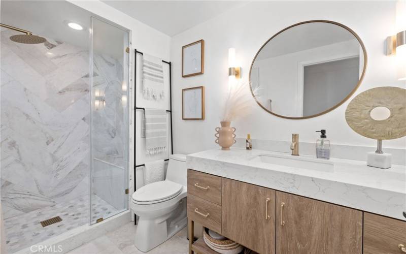 Beautifully remodeled bathroom #3. The guest bath on the main level.