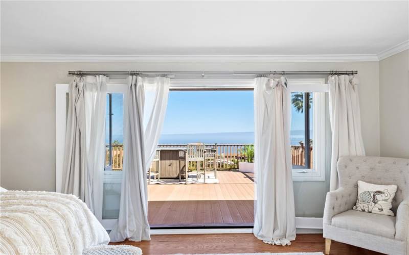 French doors open to a massive Trex sun deck. Here, you'll be captivated by jaw-dropping views of Catalina Island.